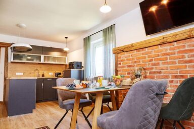 Ferienwohnungen Wald und Wiese - Ferienwohnung Wald mit überdachter Außenlounge