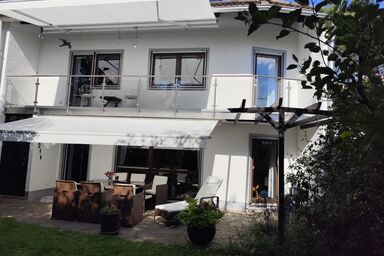 Elegant terraced house, with bikes near the lake, children at least 6 a old