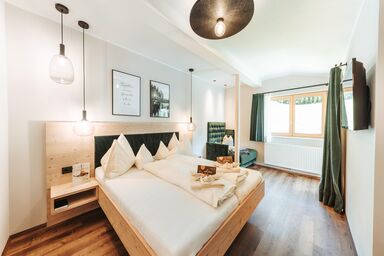 Regitnig - 4* Hotel & Chalets - Doppelzimmer Cosy Neu ÜF  4-6N