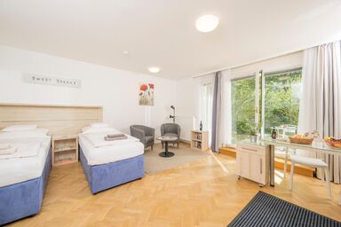 Studioappartement mit kleinem Garten und Terrasse