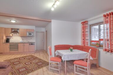 Ferienwohnung Gschwendtner - Chiemgau Karte - Ferienwohnung Orchidee für 4 Personen mit Terrasse, 58 m²