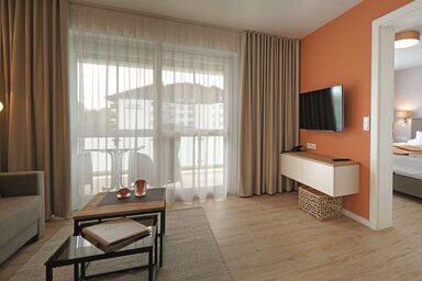 Appartementhotel Fidelio - Zwei-Zimmer-Suiten Typ 2 (44qm) mit überdachtem Balkon und Boxspringbett