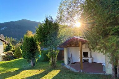 Ferienhäuser im Feriendorf Weissensee im Allgäu (E) - Ferienhaus 38-E mit Terrasse mit Kamin und Bergblick