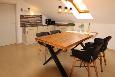 Ferienhaus "Kleine Auszeit" - Ferienwohnung 2 mit sonnigem Balkon